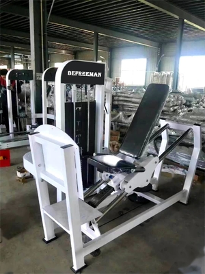 座った脚プレスマシンを使用して,フィットネス強度トレーニングのための鋼ピン負荷選択